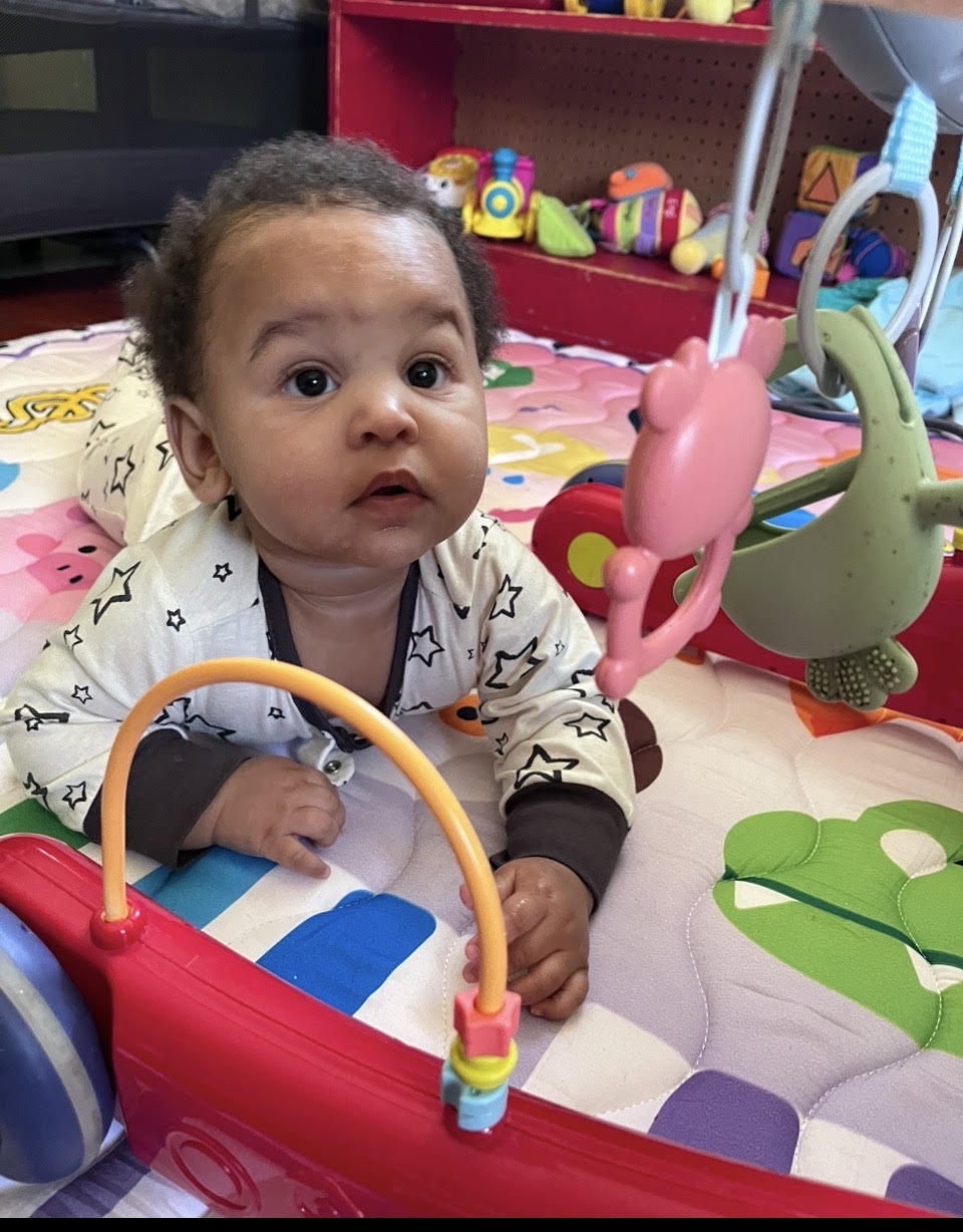 Infant Care in Havana, Florida | Teresa Delores Educational & Developmental Center Nurturing infant care in Havana, Florida — baby exploring sensory toys at Teresa Delores Educational & Developmental Center
